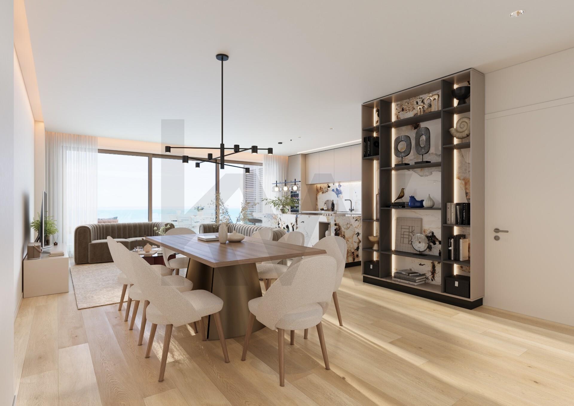 Ornelas Legacy — sala integrada com zona de refeições e vista para o mar